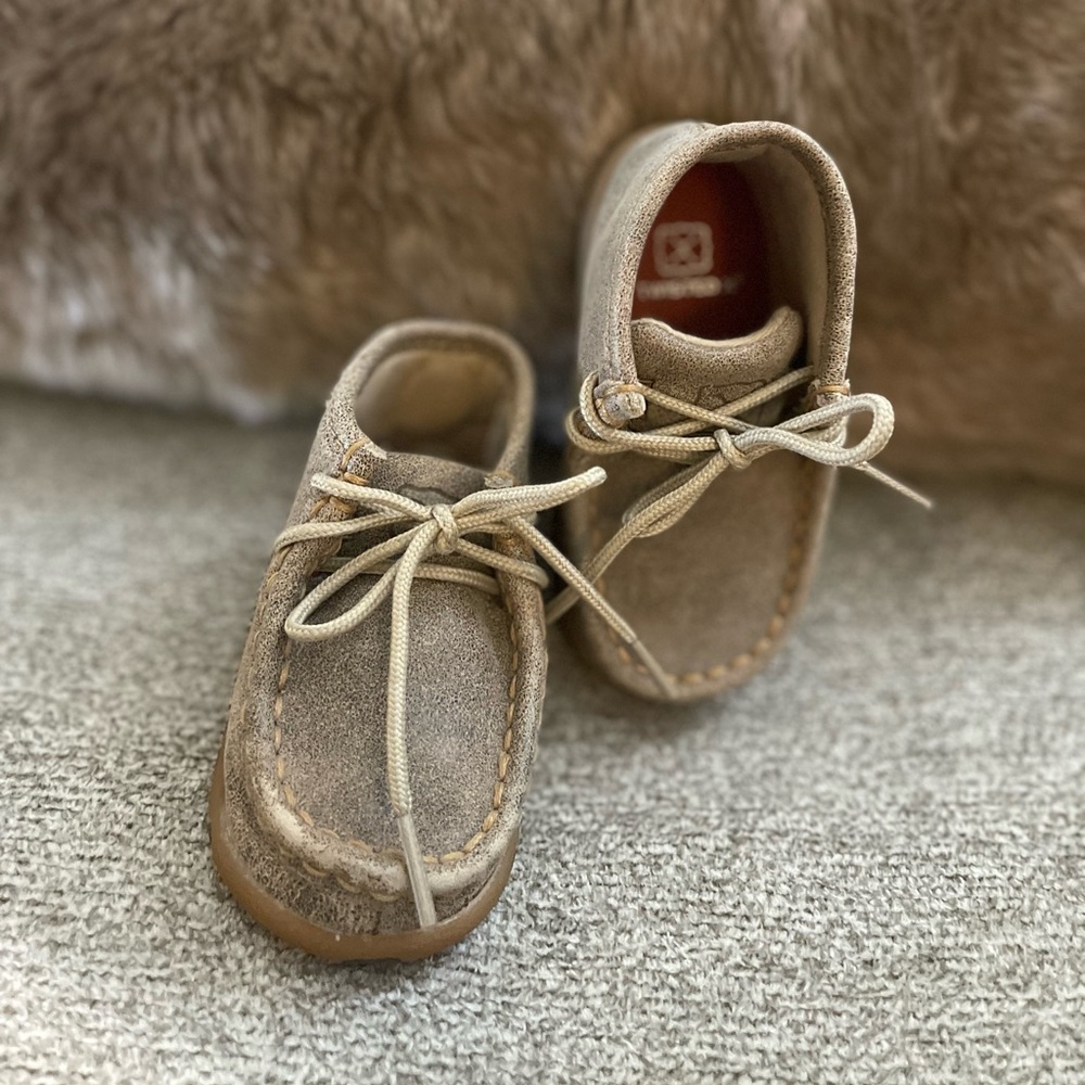 Infant size 5M twisted X